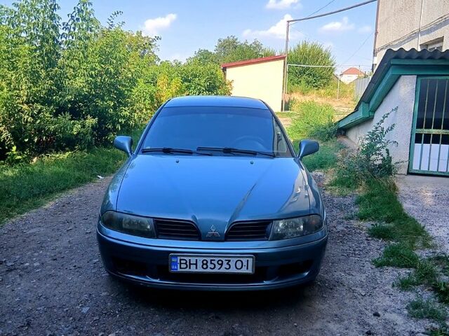 Серый Мицубиси Харизма, объемом двигателя 1.6 л и пробегом 267 тыс. км за 3500 $, фото 1 на Automoto.ua
