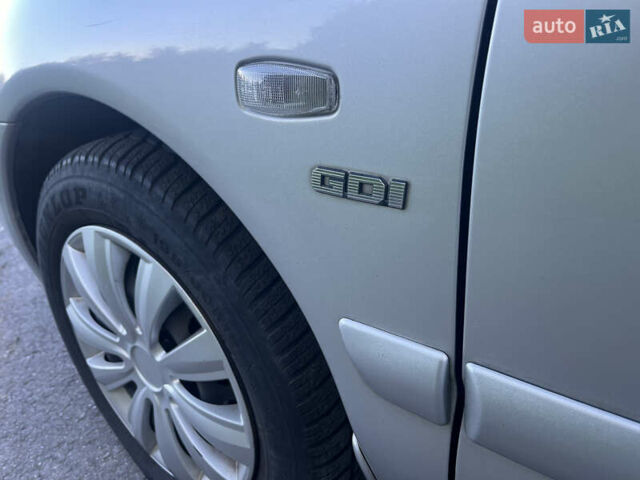 Серый Мицубиси Харизма, объемом двигателя 1.8 л и пробегом 214 тыс. км за 5650 $, фото 28 на Automoto.ua