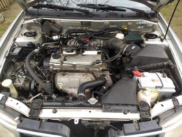 Серый Мицубиси Харизма, объемом двигателя 1.6 л и пробегом 330 тыс. км за 2800 $, фото 21 на Automoto.ua