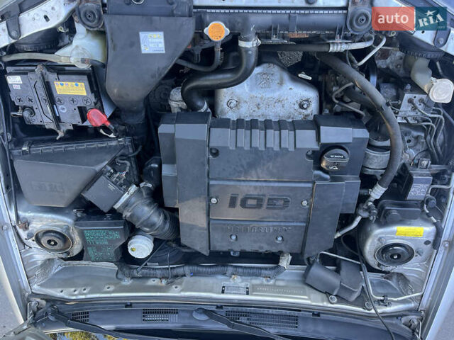 Серый Мицубиси Харизма, объемом двигателя 1.8 л и пробегом 214 тыс. км за 5650 $, фото 30 на Automoto.ua