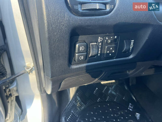 Серый Мицубиси Харизма, объемом двигателя 1.8 л и пробегом 214 тыс. км за 5650 $, фото 11 на Automoto.ua