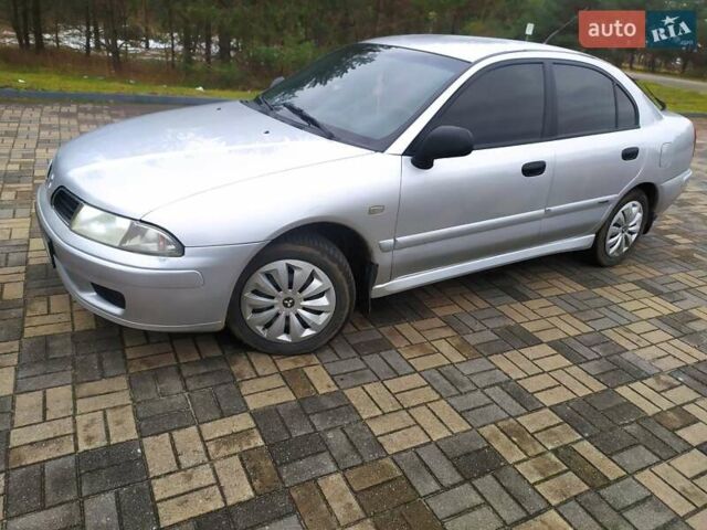 Сірий Міцубісі Харизма, об'ємом двигуна 1.6 л та пробігом 330 тис. км за 2800 $, фото 18 на Automoto.ua