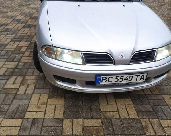 Сірий Міцубісі Харизма, об'ємом двигуна 1.6 л та пробігом 330 тис. км за 2800 $, фото 8 на Automoto.ua