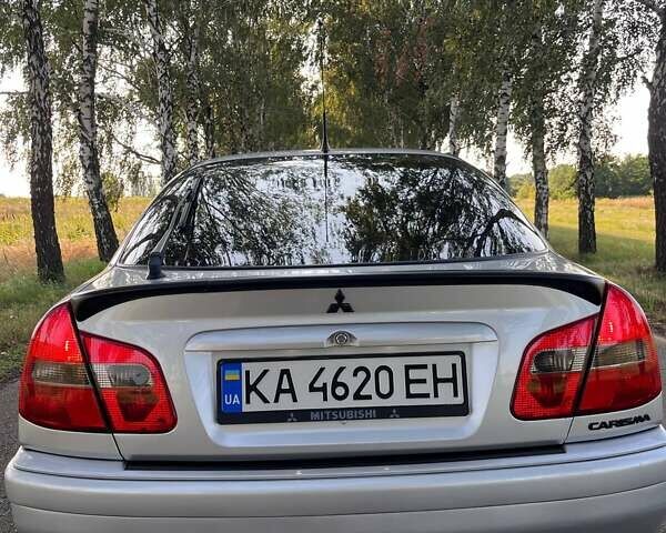 Сірий Міцубісі Харизма, об'ємом двигуна 1.6 л та пробігом 290 тис. км за 3900 $, фото 2 на Automoto.ua