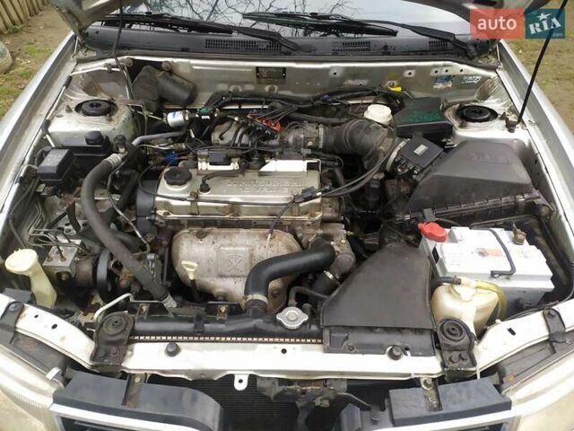 Сірий Міцубісі Харизма, об'ємом двигуна 1.6 л та пробігом 330 тис. км за 2800 $, фото 22 на Automoto.ua