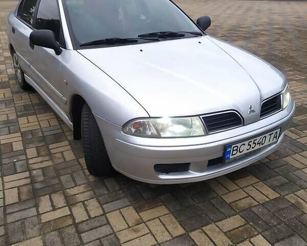 Сірий Міцубісі Харизма, об'ємом двигуна 1.6 л та пробігом 330 тис. км за 2800 $, фото 12 на Automoto.ua