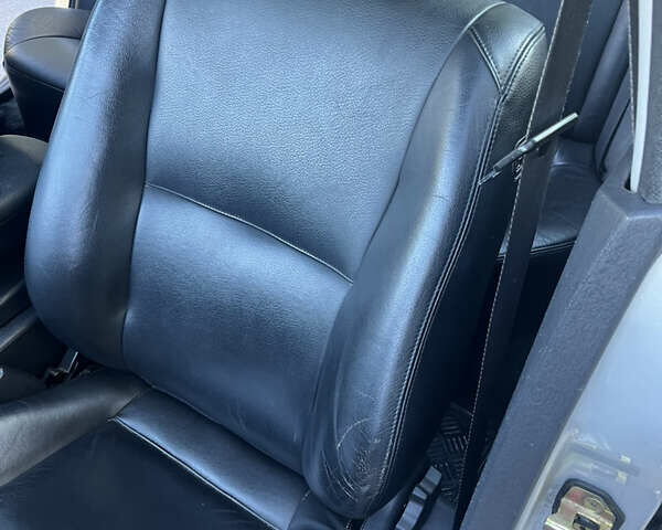 Серый Мицубиси Харизма, объемом двигателя 1.8 л и пробегом 214 тыс. км за 5650 $, фото 18 на Automoto.ua