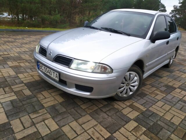 Серый Мицубиси Харизма, объемом двигателя 1.6 л и пробегом 330 тыс. км за 2800 $, фото 6 на Automoto.ua