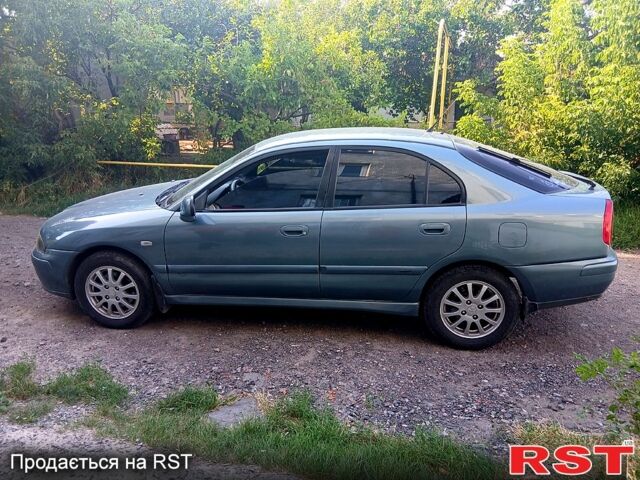 Серый Мицубиси Харизма, объемом двигателя 1.6 л и пробегом 267 тыс. км за 3500 $, фото 5 на Automoto.ua