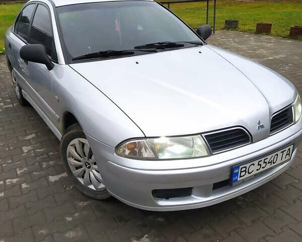 Сірий Міцубісі Харизма, об'ємом двигуна 1.6 л та пробігом 330 тис. км за 2800 $, фото 1 на Automoto.ua