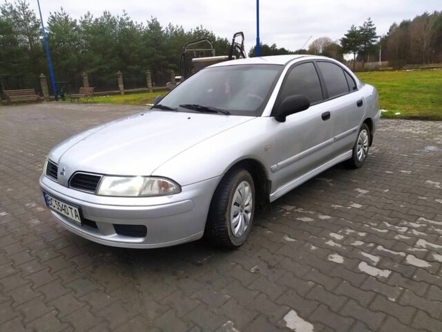 Серый Мицубиси Харизма, объемом двигателя 1.6 л и пробегом 330 тыс. км за 2800 $, фото 3 на Automoto.ua