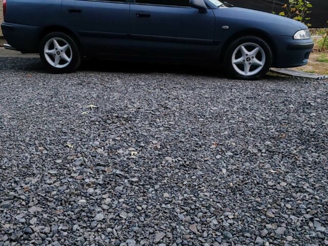 Синий Мицубиси Харизма, объемом двигателя 1.9 л и пробегом 300 тыс. км за 2576 $, фото 11 на Automoto.ua