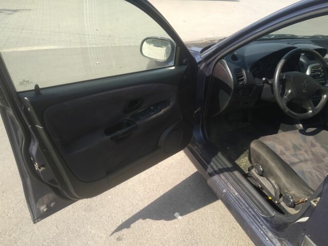 Синій Міцубісі Харизма, об'ємом двигуна 0 л та пробігом 263 тис. км за 1300 $, фото 7 на Automoto.ua