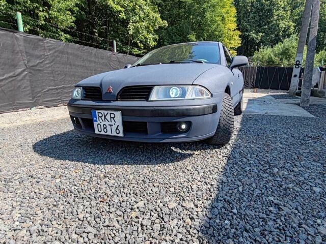 Синій Міцубісі Харизма, об'ємом двигуна 1.9 л та пробігом 300 тис. км за 2589 $, фото 7 на Automoto.ua