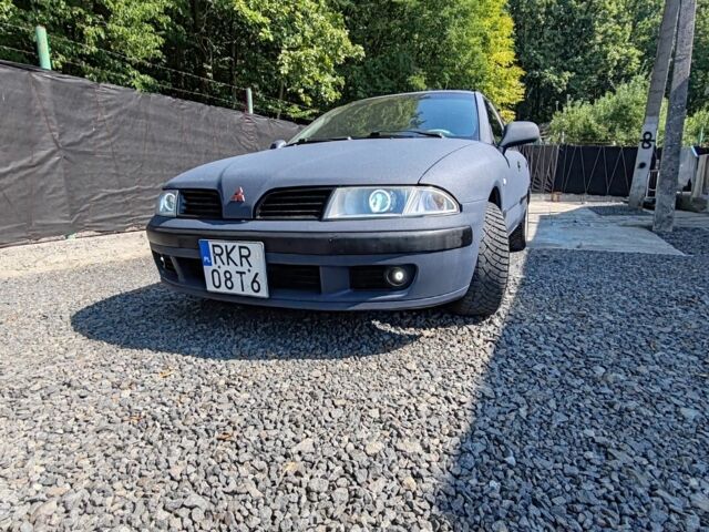 Синий Мицубиси Харизма, объемом двигателя 1.9 л и пробегом 300 тыс. км за 2576 $, фото 9 на Automoto.ua