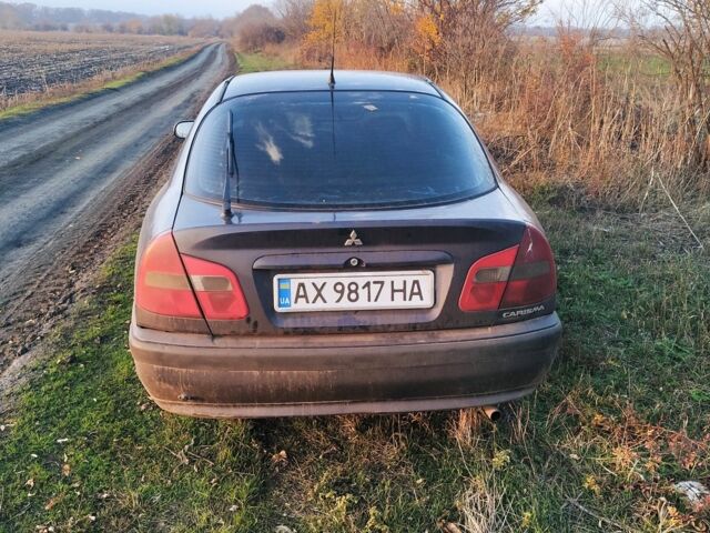 Синий Мицубиси Харизма, объемом двигателя 1.6 л и пробегом 300 тыс. км за 1800 $, фото 6 на Automoto.ua