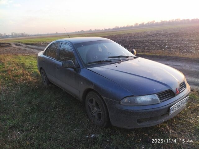 Синий Мицубиси Харизма, объемом двигателя 1.6 л и пробегом 300 тыс. км за 1800 $, фото 4 на Automoto.ua