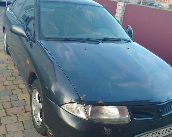 Синий Мицубиси Харизма, объемом двигателя 1.8 л и пробегом 276 тыс. км за 2400 $, фото 5 на Automoto.ua