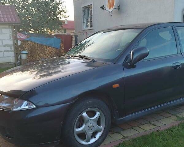 Синий Мицубиси Харизма, объемом двигателя 1.8 л и пробегом 276 тыс. км за 2400 $, фото 10 на Automoto.ua