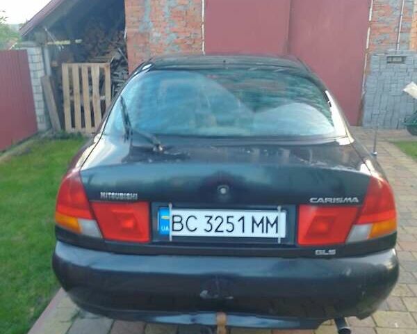 Синий Мицубиси Харизма, объемом двигателя 1.8 л и пробегом 276 тыс. км за 2400 $, фото 6 на Automoto.ua