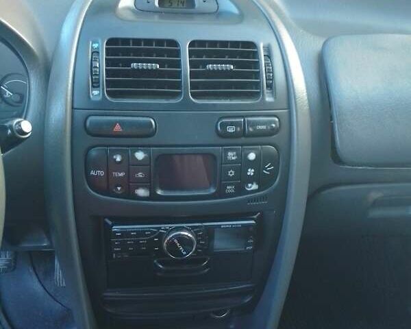 Синий Мицубиси Харизма, объемом двигателя 1.8 л и пробегом 276 тыс. км за 2400 $, фото 3 на Automoto.ua