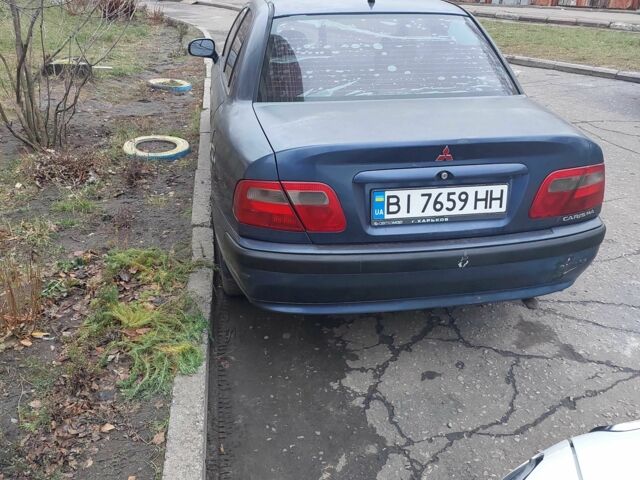 Синий Мицубиси Харизма, объемом двигателя 1.6 л и пробегом 450 тыс. км за 1800 $, фото 6 на Automoto.ua