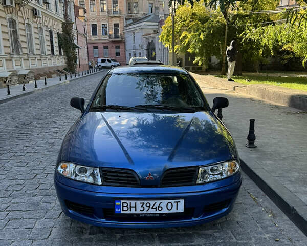 Синій Міцубісі Харизма, об'ємом двигуна 1.83 л та пробігом 310 тис. км за 4000 $, фото 2 на Automoto.ua