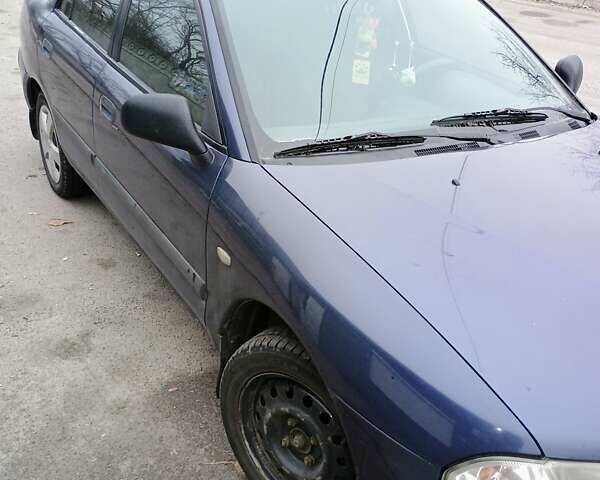 Синій Міцубісі Харизма, об'ємом двигуна 1.6 л та пробігом 260 тис. км за 2600 $, фото 2 на Automoto.ua