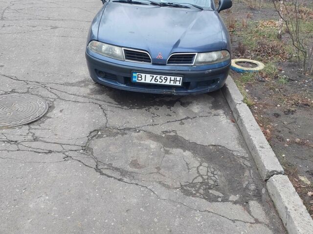 Синий Мицубиси Харизма, объемом двигателя 1.6 л и пробегом 450 тыс. км за 1800 $, фото 13 на Automoto.ua