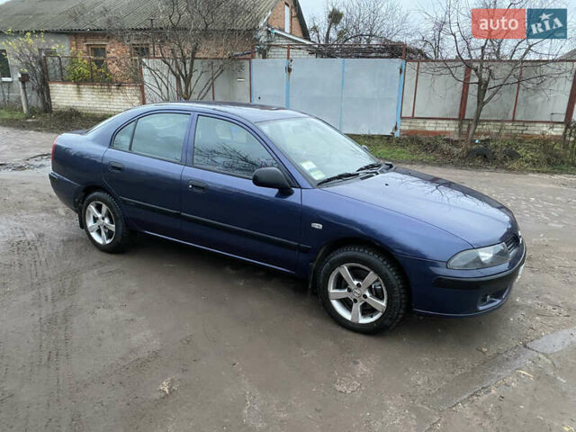 Синій Міцубісі Харизма, об'ємом двигуна 1.6 л та пробігом 170 тис. км за 3000 $, фото 8 на Automoto.ua