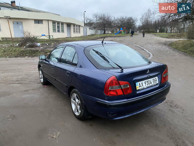 Синій Міцубісі Харизма, об'ємом двигуна 1.6 л та пробігом 170 тис. км за 3000 $, фото 4 на Automoto.ua