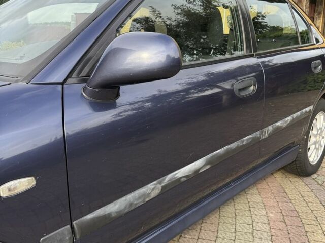 Синий Мицубиси Харизма, объемом двигателя 1.8 л и пробегом 275 тыс. км за 3000 $, фото 3 на Automoto.ua