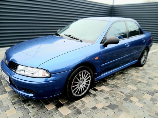 Синий Мицубиси Харизма, объемом двигателя 1.8 л и пробегом 305 тыс. км за 3999 $, фото 8 на Automoto.ua