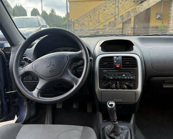 Синий Мицубиси Харизма, объемом двигателя 1.83 л и пробегом 275 тыс. км за 3400 $, фото 14 на Automoto.ua