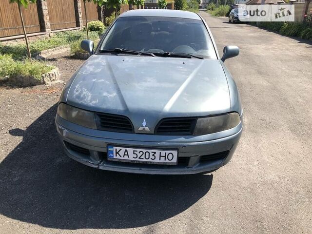 Синий Мицубиси Харизма, объемом двигателя 1.6 л и пробегом 190 тыс. км за 2600 $, фото 1 на Automoto.ua