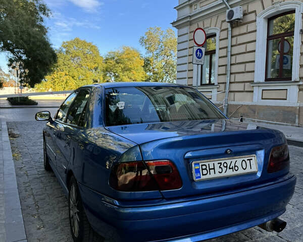 Синий Мицубиси Харизма, объемом двигателя 1.83 л и пробегом 303 тыс. км за 3000 $, фото 1 на Automoto.ua