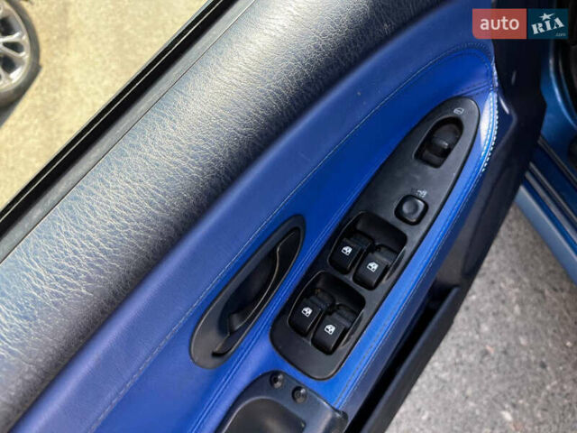Синий Мицубиси Харизма, объемом двигателя 1.83 л и пробегом 303 тыс. км за 3000 $, фото 10 на Automoto.ua