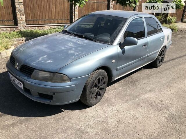 Синий Мицубиси Харизма, объемом двигателя 1.6 л и пробегом 190 тыс. км за 2600 $, фото 5 на Automoto.ua