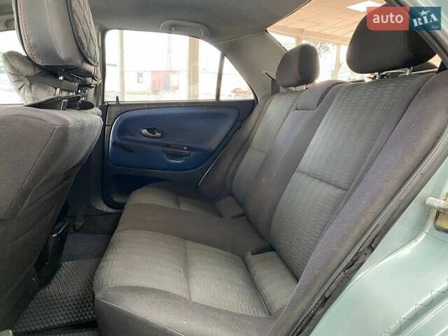 Синий Мицубиси Харизма, объемом двигателя 1.6 л и пробегом 346 тыс. км за 2990 $, фото 25 на Automoto.ua