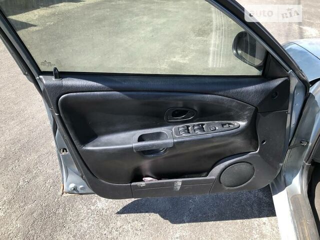 Синий Мицубиси Харизма, объемом двигателя 1.6 л и пробегом 190 тыс. км за 2600 $, фото 10 на Automoto.ua