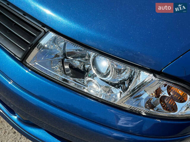 Синий Мицубиси Харизма, объемом двигателя 1.83 л и пробегом 303 тыс. км за 3000 $, фото 5 на Automoto.ua