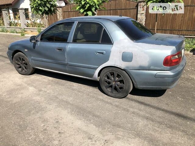 Синий Мицубиси Харизма, объемом двигателя 1.6 л и пробегом 190 тыс. км за 2600 $, фото 3 на Automoto.ua