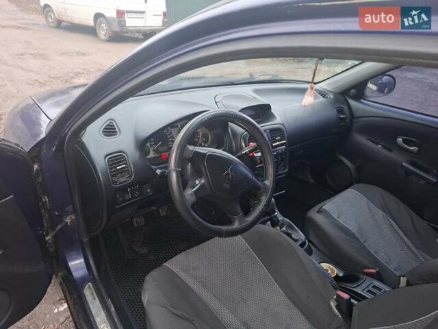 Синій Міцубісі Харизма, об'ємом двигуна 1.83 л та пробігом 205 тис. км за 2100 $, фото 4 на Automoto.ua