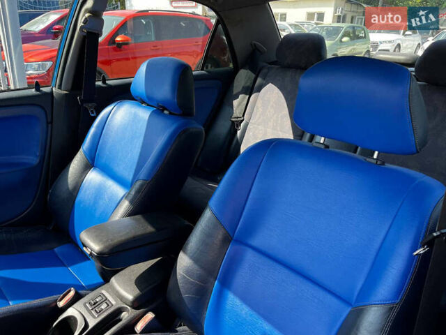 Синий Мицубиси Харизма, объемом двигателя 1.83 л и пробегом 303 тыс. км за 3000 $, фото 7 на Automoto.ua