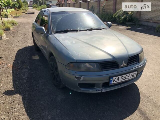 Синий Мицубиси Харизма, объемом двигателя 1.6 л и пробегом 190 тыс. км за 2600 $, фото 6 на Automoto.ua