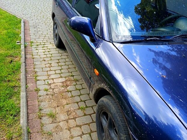 Синій Міцубісі Харизма, об'ємом двигуна 1.6 л та пробігом 300 тис. км за 1900 $, фото 4 на Automoto.ua