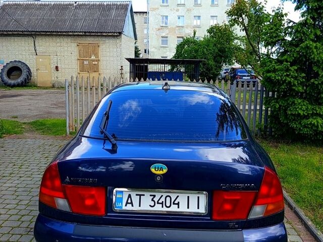 Синій Міцубісі Харизма, об'ємом двигуна 1.6 л та пробігом 300 тис. км за 1900 $, фото 5 на Automoto.ua