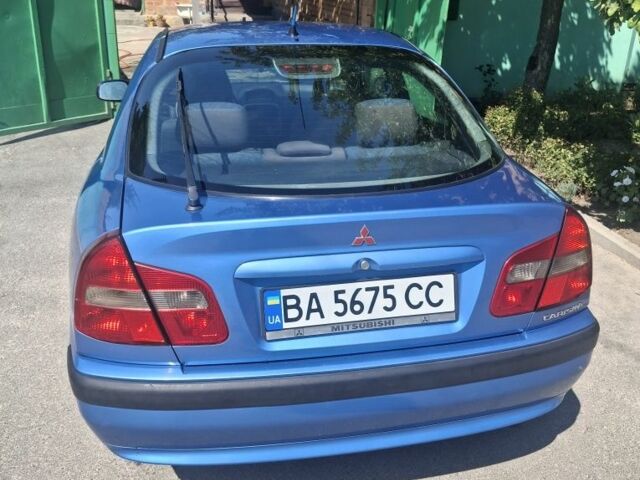 Синій Міцубісі Харизма, об'ємом двигуна 0 л та пробігом 191 тис. км за 3100 $, фото 12 на Automoto.ua