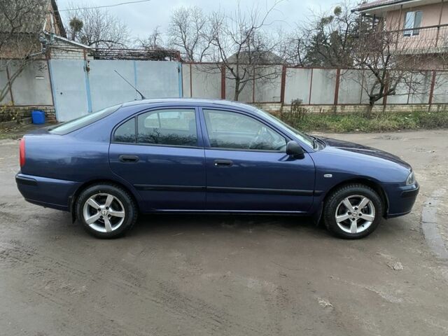 Синій Міцубісі Харизма, об'ємом двигуна 1.6 л та пробігом 170 тис. км за 3000 $, фото 9 на Automoto.ua