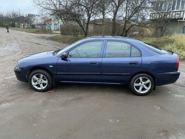 Синій Міцубісі Харизма, об'ємом двигуна 1.6 л та пробігом 170 тис. км за 3000 $, фото 2 на Automoto.ua